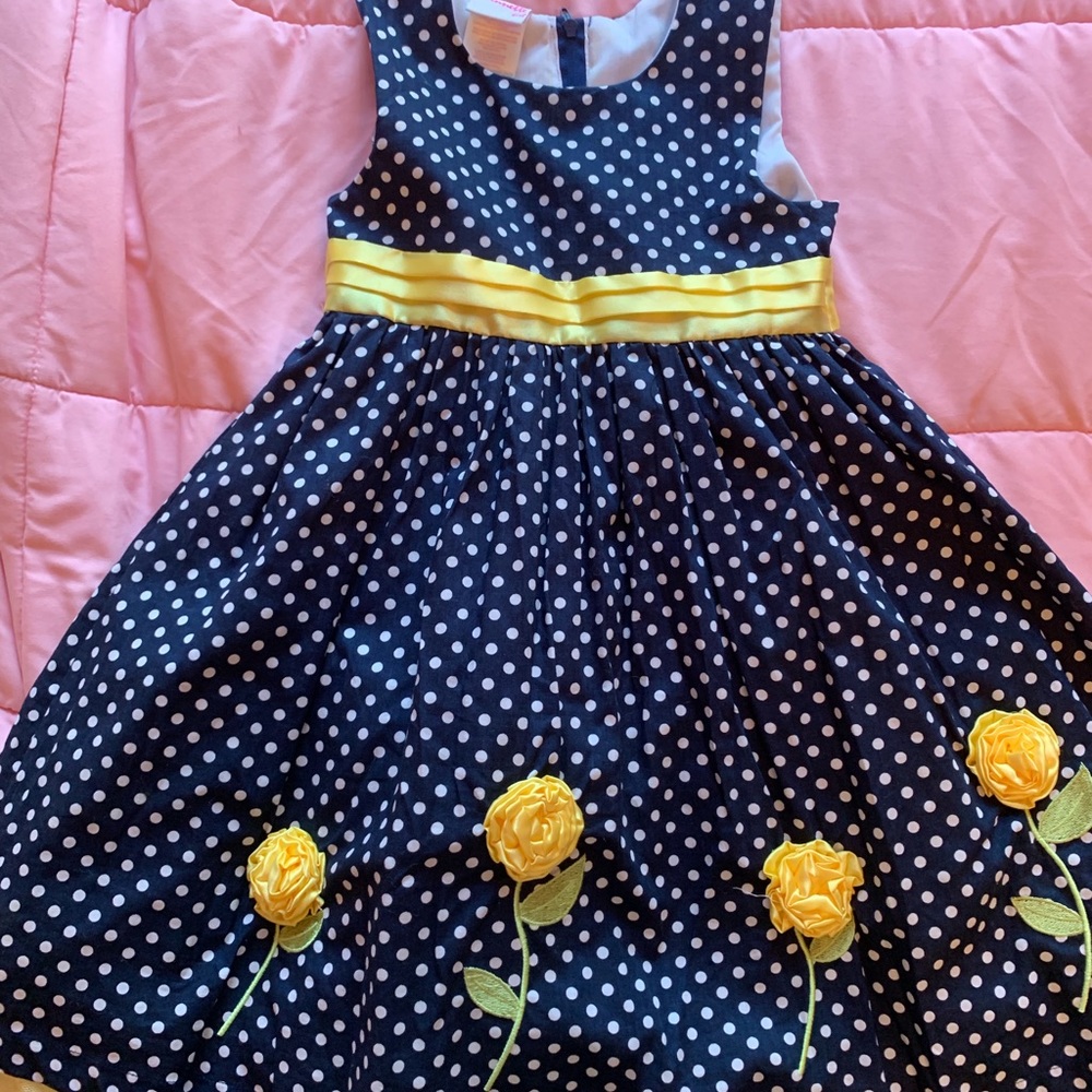 Girl’s navy/white polka dot dress